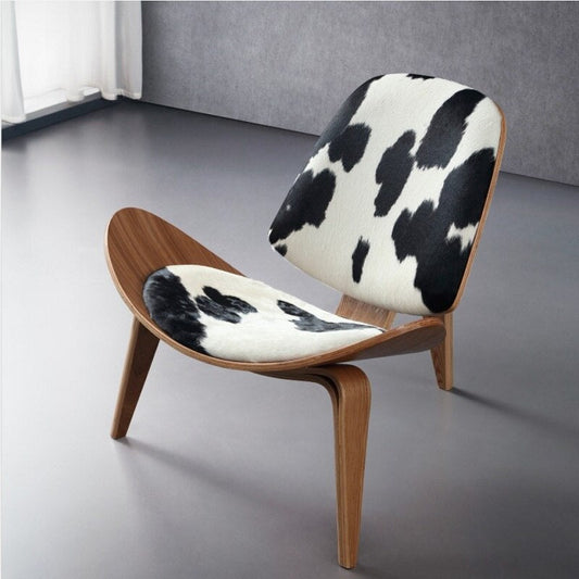La chaise Shell JL Mollers peau de vache