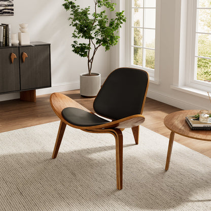 La chaise Shell JL Mollers noir